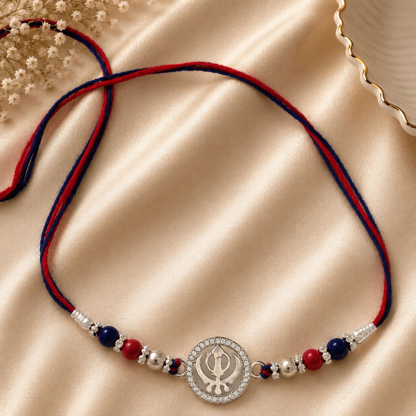 Khanda Symbol Rakhi with Sparkling Silver CZ Elegance