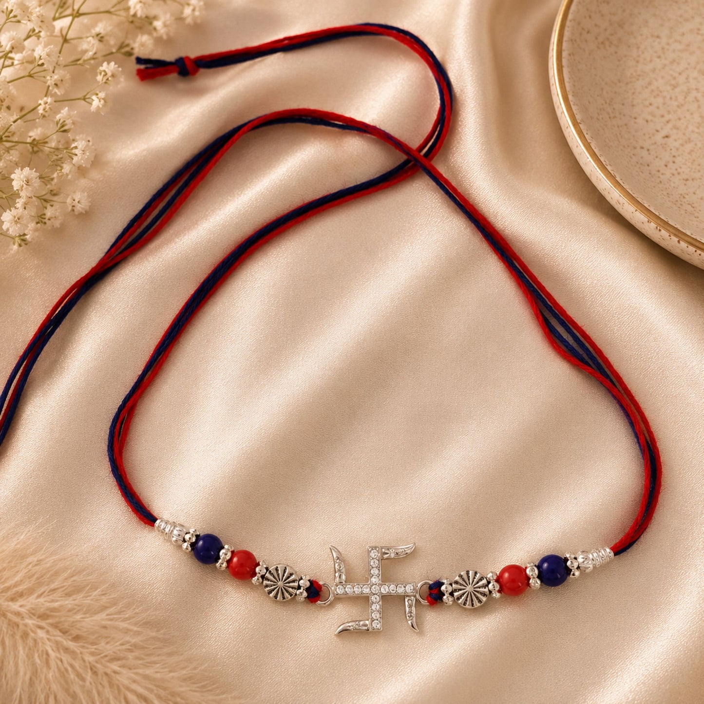 Sterling Silver Swastik Rakhi with Sparkling CZ Stones