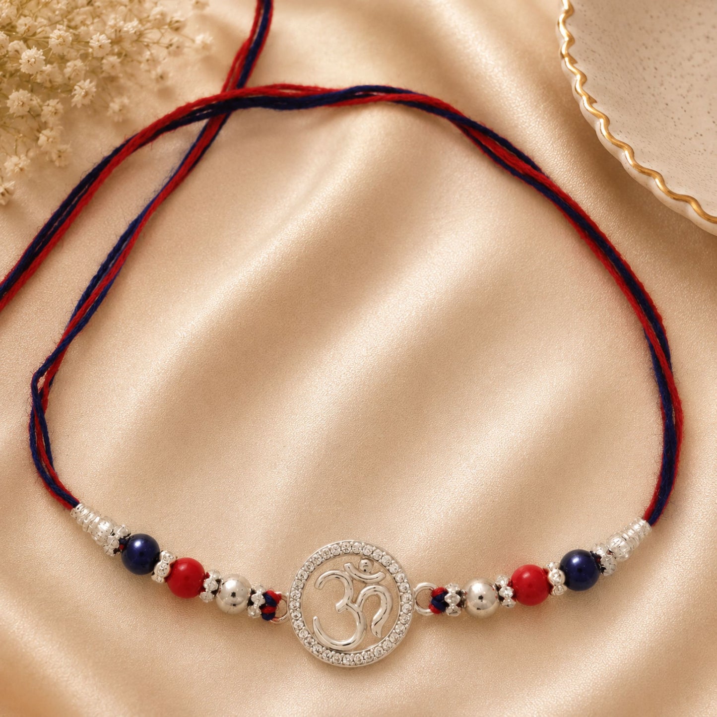 925 Sterling Silver CZ Om Symbol Rakhi with Red & Blue Thread