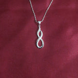 Infinity Twist Lab-Grown Diamond Pendant in Sterling Silver