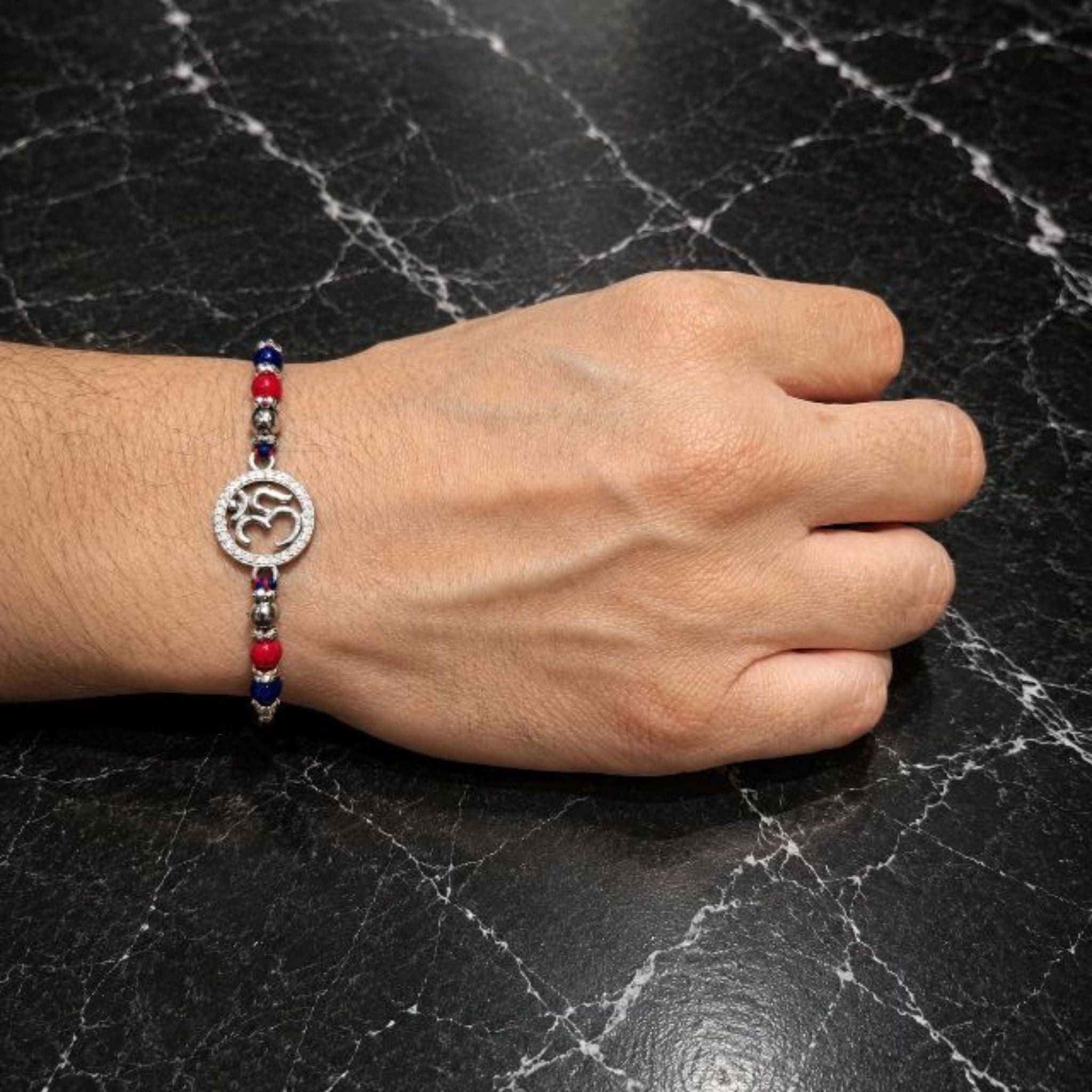 925 Sterling Silver CZ Om Symbol Rakhi with Red & Blue Thread