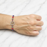 Sacred Swastik Silver Rakhi with Sparkling CZ Elegance