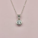 925 Sterling Silver Bezel-Set Round Cut Cubic Zirconia Pendant and Earrings Set