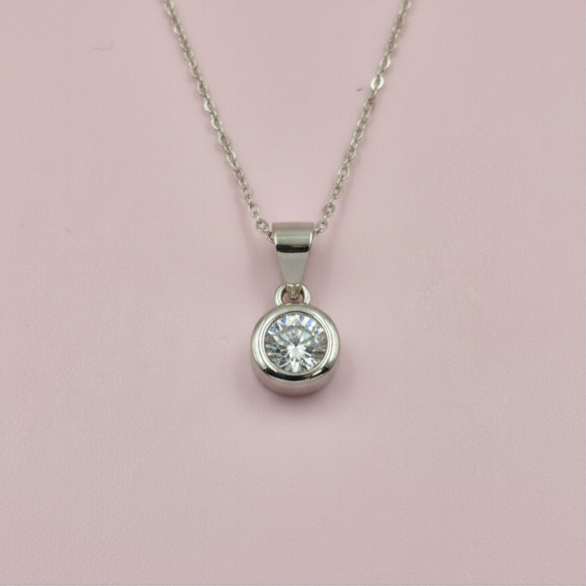 925 Sterling Silver Bezel-Set Round Cut Cubic Zirconia Pendant and Earrings Set
