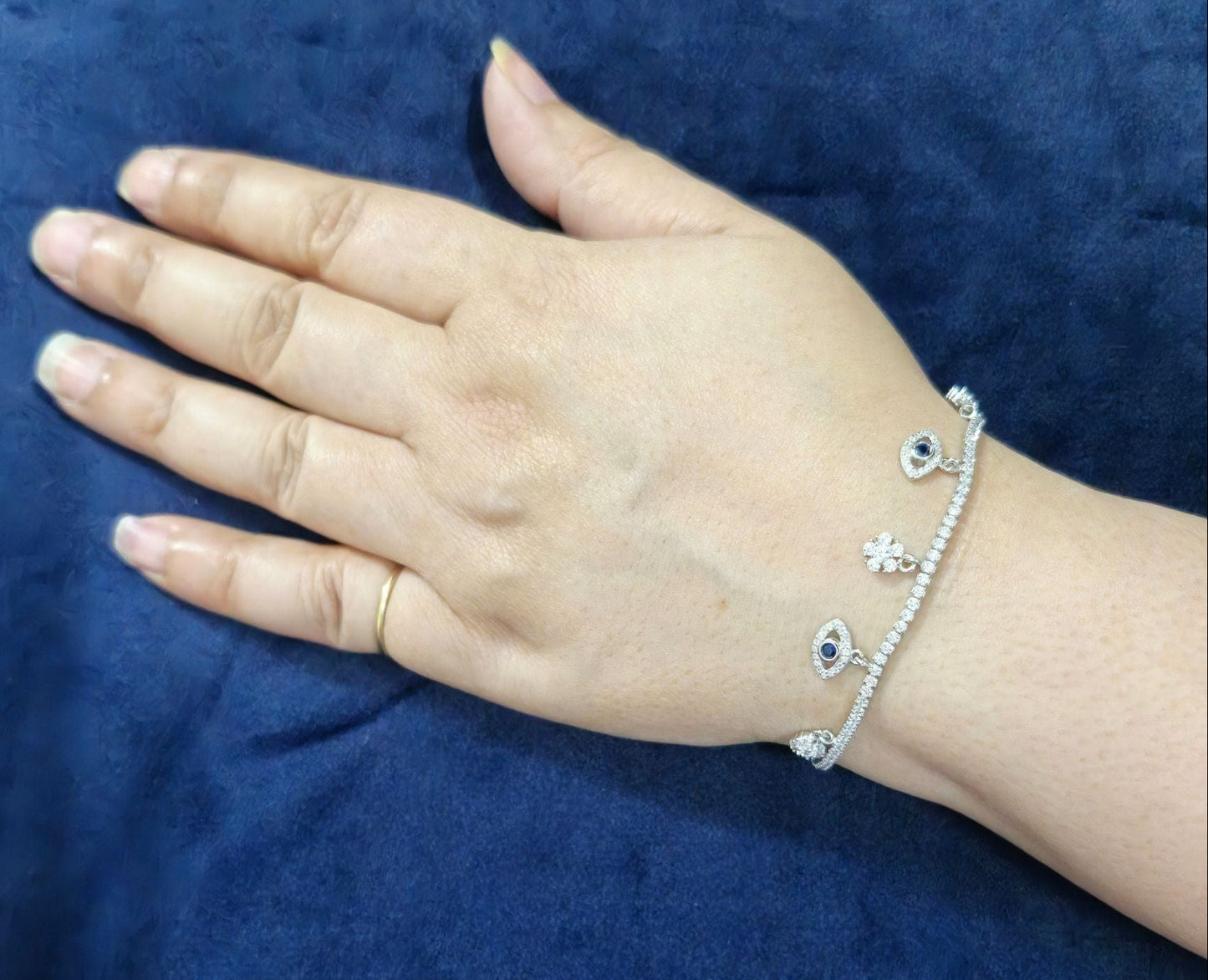 925 Sterling Silver Tennis Bracelet with Floral & Evil Eye Charm Accents