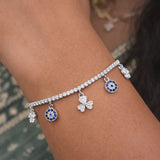 925 Sterling Silver Tennis Bracelet with Floral Charm Accents and Cubic Zirconia