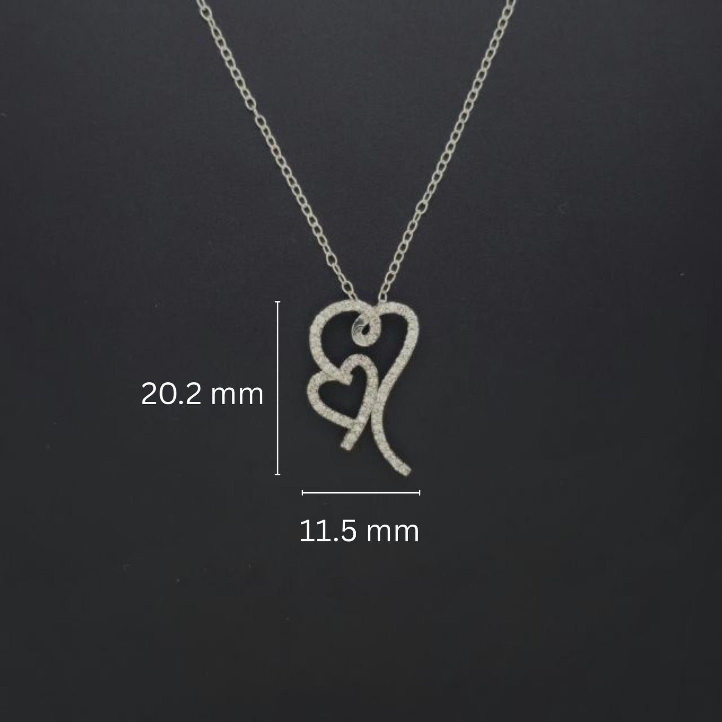 Interlocking heart pendant adorned with sparkling lab-grown diamonds