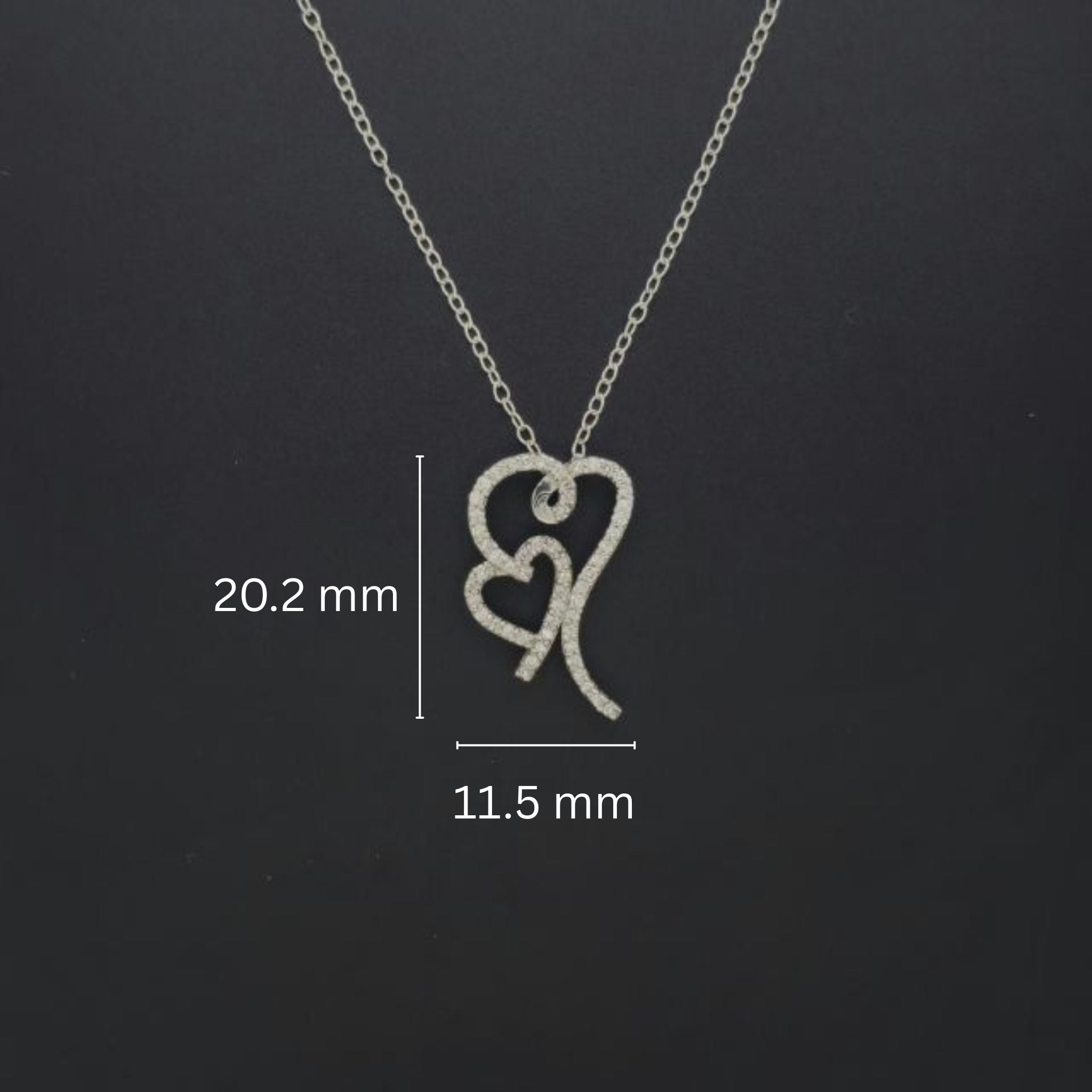 Interlocking heart pendant adorned with sparkling lab-grown diamonds
