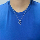 Interlocking heart pendant adorned with sparkling lab-grown diamonds